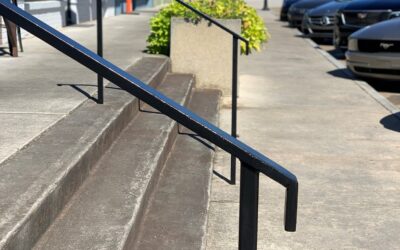 Tucker-Northlake CID Paints Railings on Main Street